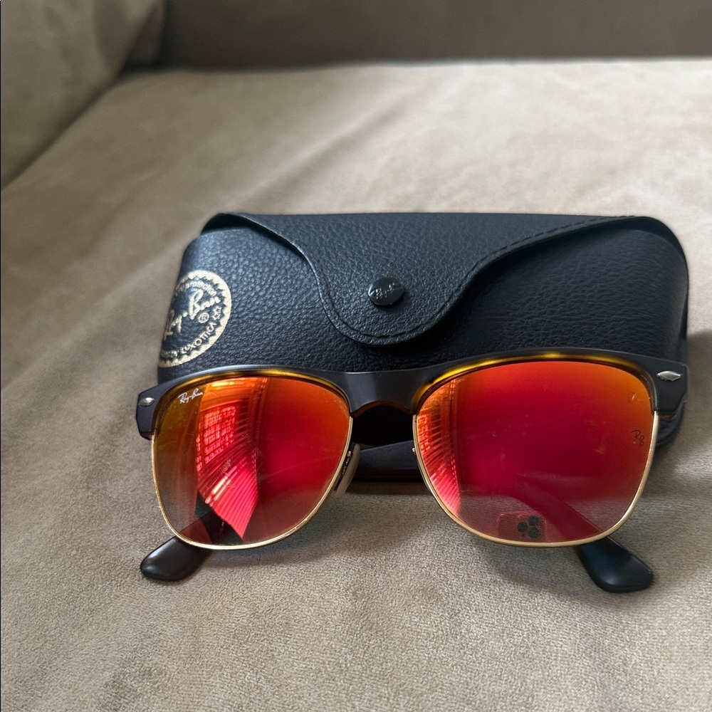 Ray-Ban Sunglasses with Gold Frame and Red Lenses